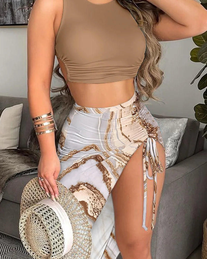 Solid cropped top with marble print drawstring ruched side slit skirt set